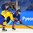 GANGNEUNG, SOUTH KOREA - FEBRUARY 12: Sweden's Johanna Fallman #5 and Korea's Jiyeon Choi #10 battle for a bouncing puck during preliminary round action at the PyeongChang 2018 Olympic Winter Games. (Photo by Matt Zambonin/HHOF-IIHF Images)

